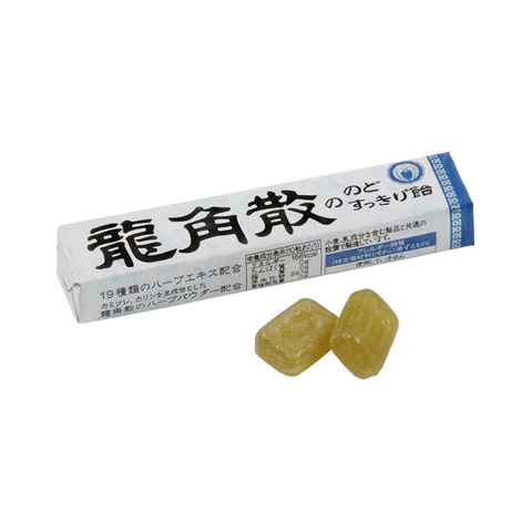 Open pack of Dragon Horn Powder Peppermint Lozenges with two candies displayed